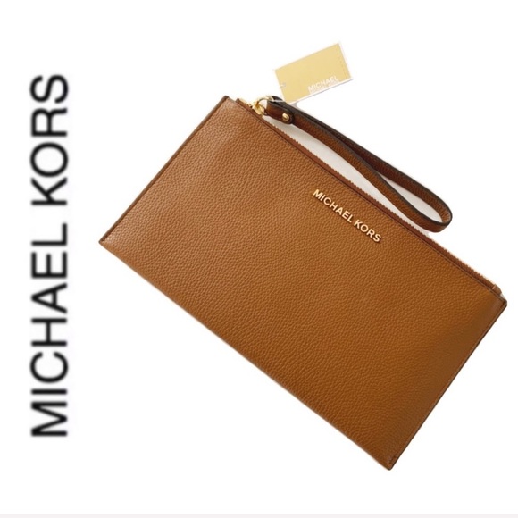 Michael Kors Handbags - NWT authentic MK genuine leather wristlet